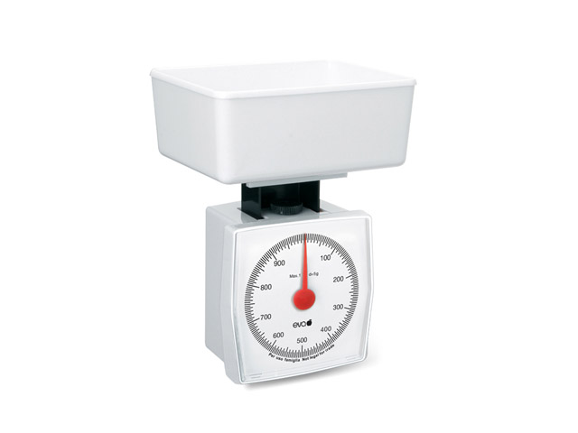 BILANCIA CUCINA EVA KG1Bilancia meccanica bianca con quadrante ad orologio, corpo e bacinella in ABS. Portata 1kg, suddivisione 