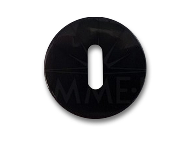 Bocchetta tonda nera in nylon con foro Patent, serie Minny. Diametro mm.50, spessore mm.7. Colore nero.
